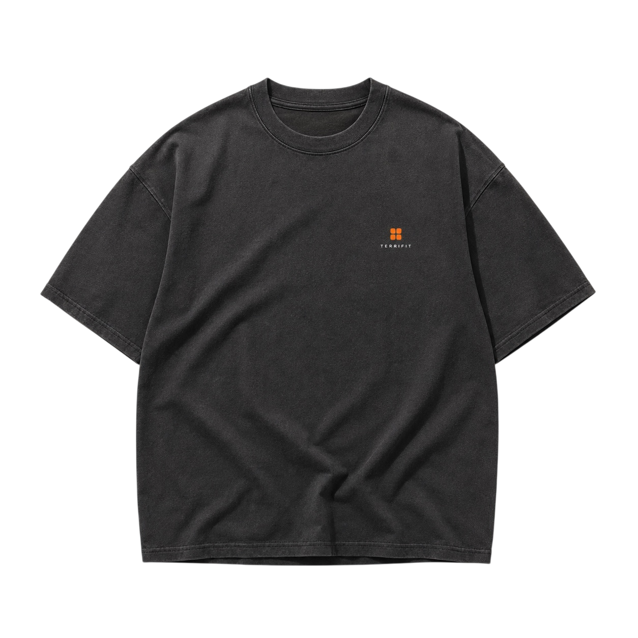 Heavyweight charcoal training t-shirt laid flat on concrete with a small orange Terrifit mark on the chest